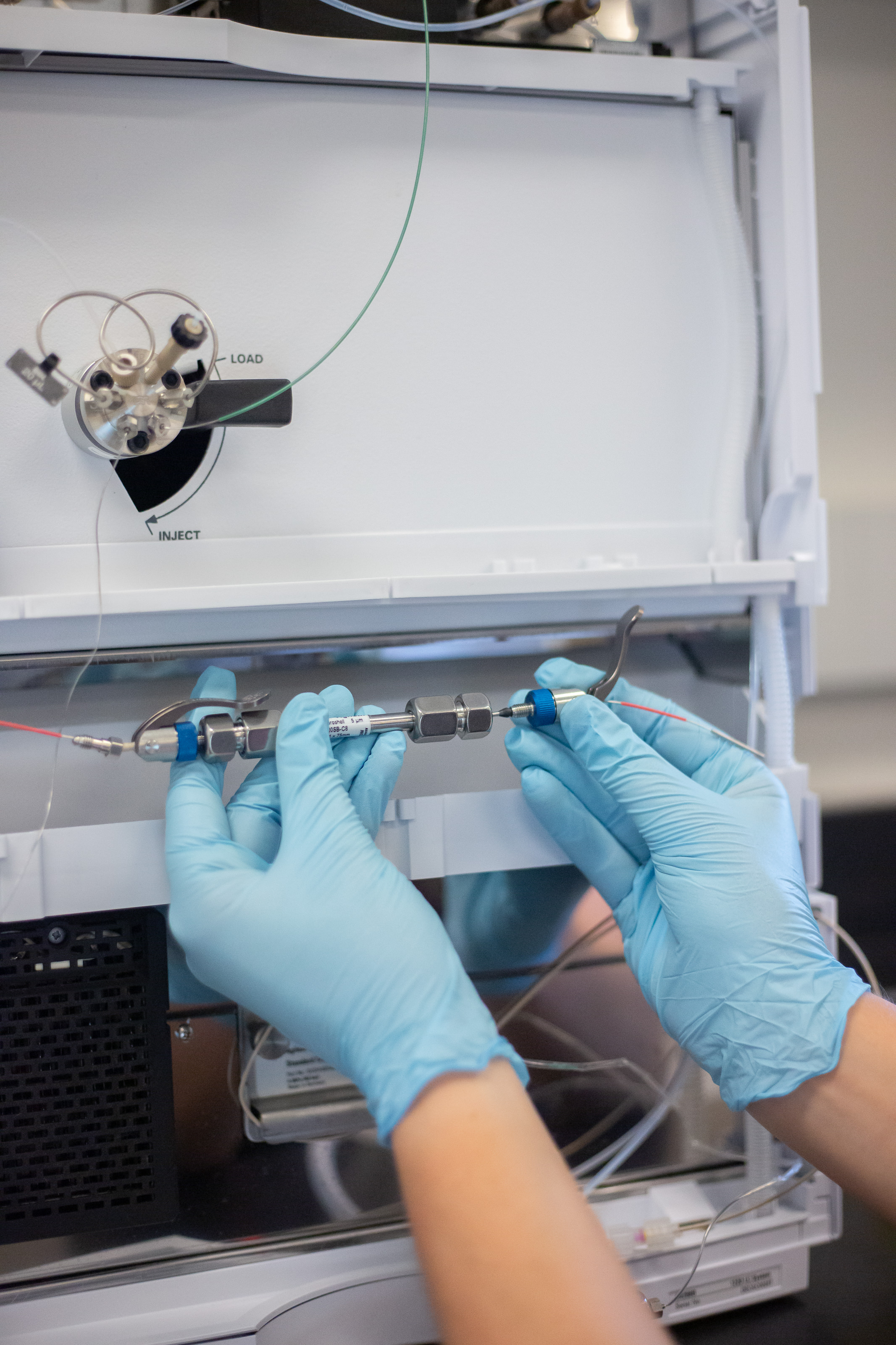 Scientist installing Agilent HPLC Column