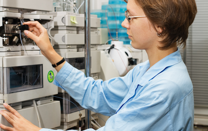 Scientist using an HPLC system for synthetic opioid detection